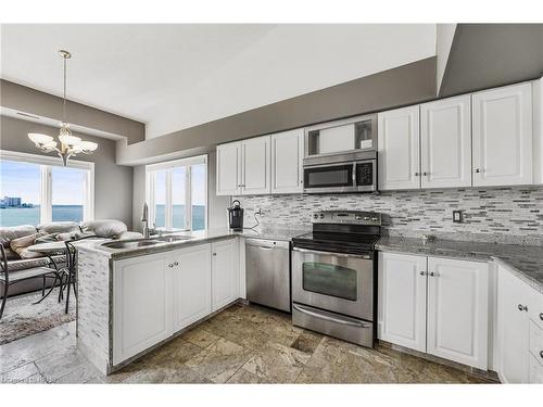 491-493 Dewitt Road, Stoney Creek, ON - Indoor Photo Showing Kitchen With Double Sink