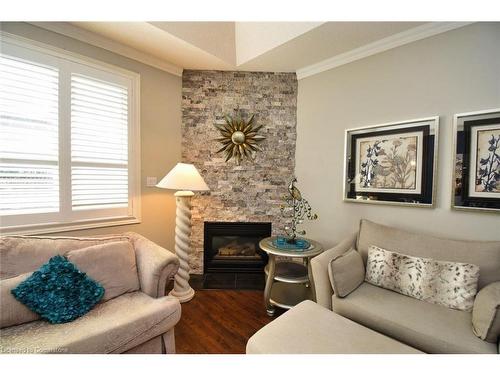 21 Greentrail Drive, Mount Hope, ON - Indoor Photo Showing Living Room With Fireplace