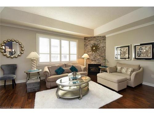 21 Greentrail Drive, Mount Hope, ON - Indoor Photo Showing Living Room With Fireplace