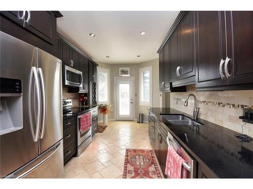 21 Greentrail Drive, Mount Hope, ON - Indoor Photo Showing Kitchen With Double Sink With Upgraded Kitchen