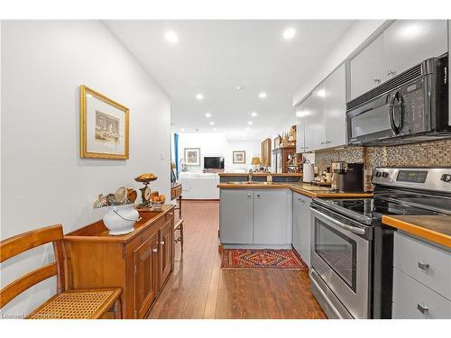 3-23 Macaulay Street W, Hamilton, ON - Indoor Photo Showing Kitchen With Double Sink