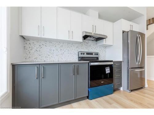 201-280 Equestrian Way, Cambridge, ON - Indoor Photo Showing Kitchen With Stainless Steel Kitchen