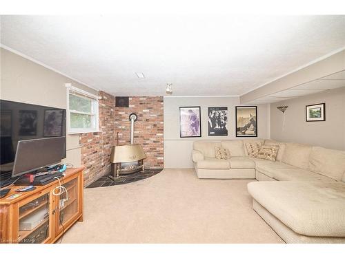 79 Wellbrook Boulevard, Welland, ON - Indoor Photo Showing Living Room With Fireplace