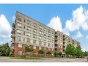 105-5070 Fairview Street, Burlington, ON  - Outdoor With Balcony With Facade 