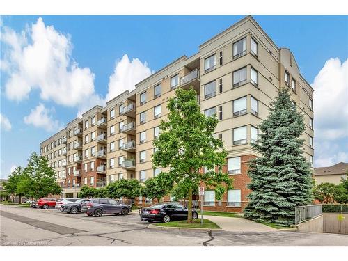 105-5070 Fairview Street, Burlington, ON - Outdoor With Balcony With Facade