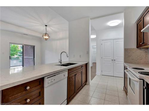 105-5070 Fairview Street, Burlington, ON - Indoor Photo Showing Kitchen With Double Sink