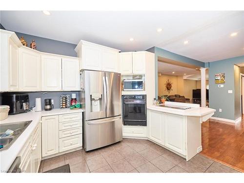 6073 Dixon Street, Niagara Falls, ON - Indoor Photo Showing Kitchen With Double Sink