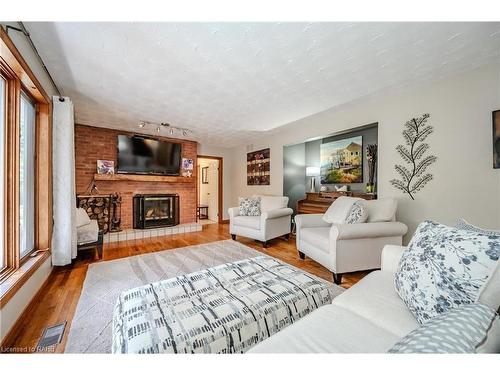 1930 West River Road, Cambridge, ON - Indoor Photo Showing Living Room With Fireplace