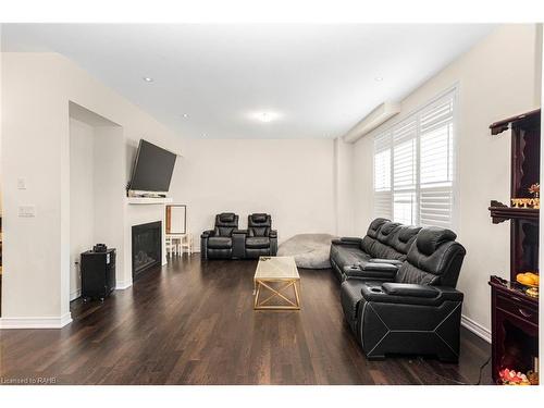 90 Spitfire Drive, Mount Hope, ON - Indoor Photo Showing Living Room With Fireplace