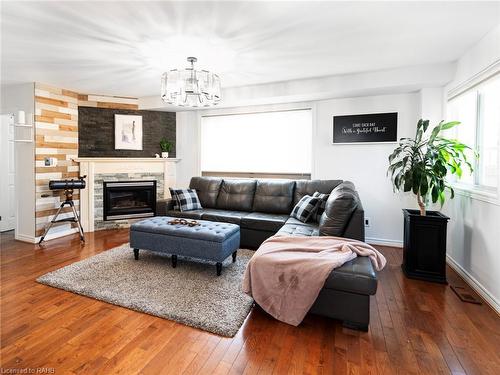 592 Rendezvous Court, Windsor, ON - Indoor Photo Showing Living Room With Fireplace