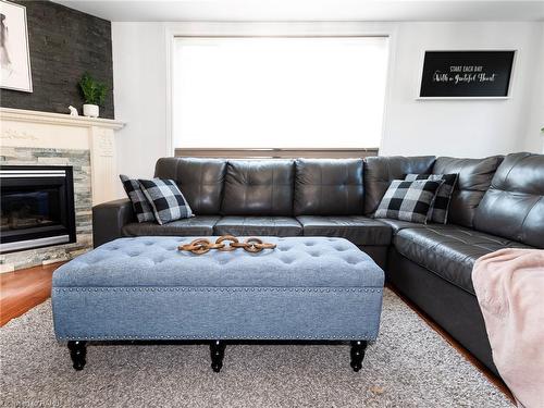 592 Rendezvous Court, Windsor, ON - Indoor Photo Showing Living Room With Fireplace