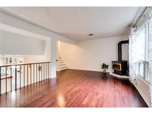 6-6 Trudy Court, Dundas, ON - Indoor Photo Showing Other Room With Fireplace