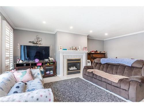 24 Spartan Avenue, Stoney Creek, ON - Indoor Photo Showing Living Room With Fireplace