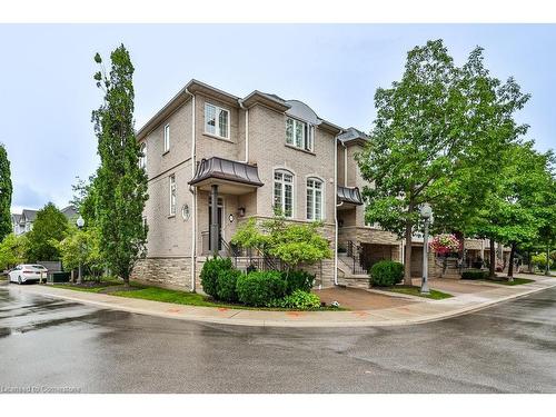 65-1267 Dorval Drive, Oakville, ON - Outdoor With Facade