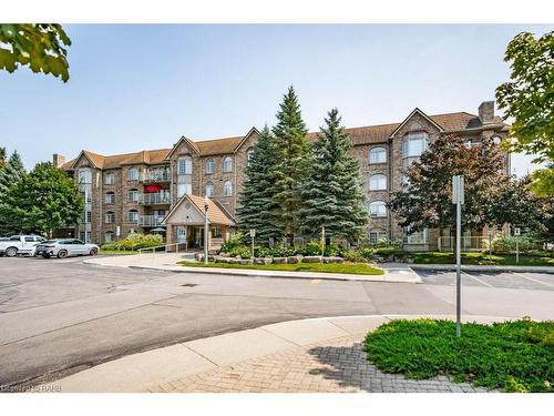 D307-216 Plains Road W, Burlington, ON - Outdoor With Balcony With Facade