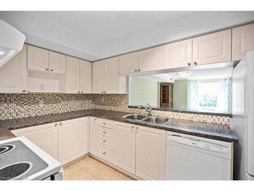 D307-216 Plains Road W, Burlington, ON - Indoor Photo Showing Kitchen With Double Sink