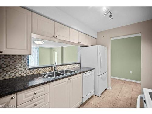 D307-216 Plains Road W, Burlington, ON - Indoor Photo Showing Kitchen With Double Sink