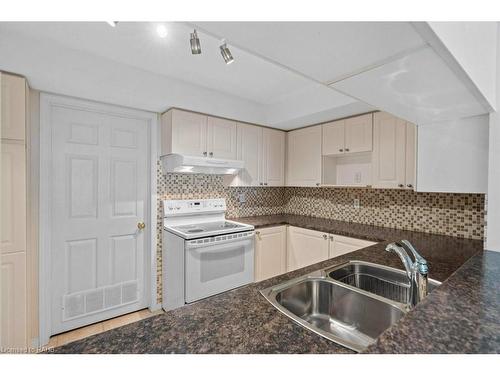 D307-216 Plains Road W, Burlington, ON - Indoor Photo Showing Kitchen With Double Sink