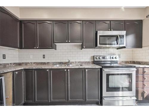 59-39 Pinewoods Drive, Stoney Creek, ON - Indoor Photo Showing Kitchen With Double Sink