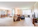 305-150 Wilson Street W, Ancaster, ON  - Indoor Photo Showing Living Room With Fireplace 