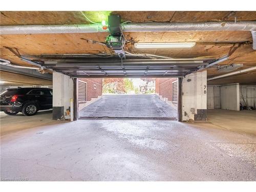 305-150 Wilson Street W, Ancaster, ON - Indoor Photo Showing Garage