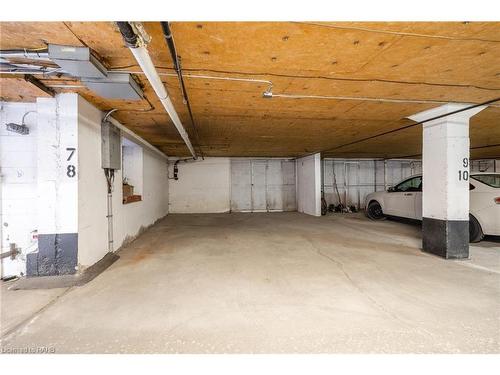 305-150 Wilson Street W, Ancaster, ON - Indoor Photo Showing Garage