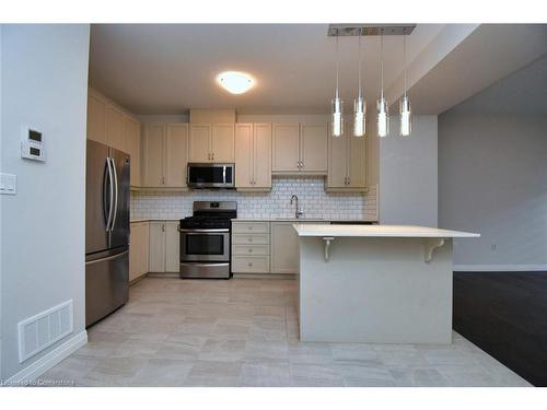 4-30 Times Square Boulevard, Stoney Creek, ON - Indoor Photo Showing Kitchen With Upgraded Kitchen