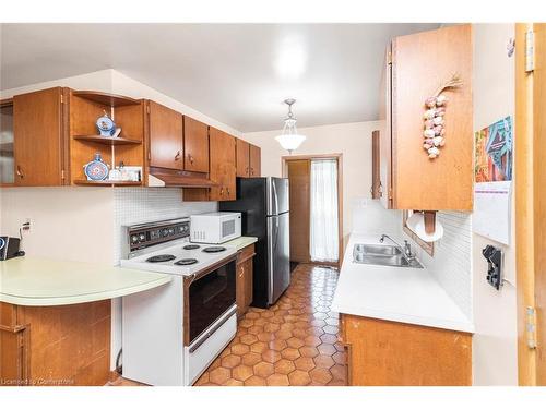 14 Calvert Avenue, Hamilton, ON - Indoor Photo Showing Kitchen With Double Sink