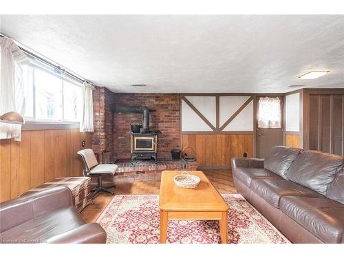 14 Calvert Avenue, Hamilton, ON - Indoor Photo Showing Living Room With Fireplace