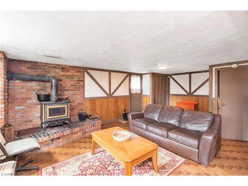 14 Calvert Avenue, Hamilton, ON - Indoor Photo Showing Living Room With Fireplace