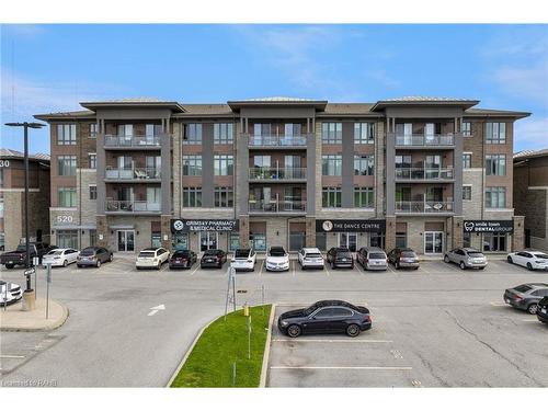 209-520 North Service Road, Grimsby, ON - Outdoor With Balcony With Facade