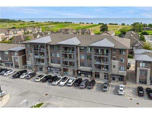 209-520 North Service Road, Grimsby, ON - Outdoor With Body Of Water With Balcony With Facade