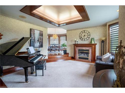 7775 St. Augustine Crescent, Niagara Falls, ON - Indoor Photo Showing Living Room With Fireplace