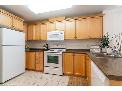 216-125 Wilson Street W, Ancaster, ON - Indoor Photo Showing Kitchen With Double Sink