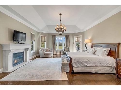 5100 14 Side Road, Milton, ON - Indoor Photo Showing Bedroom With Fireplace