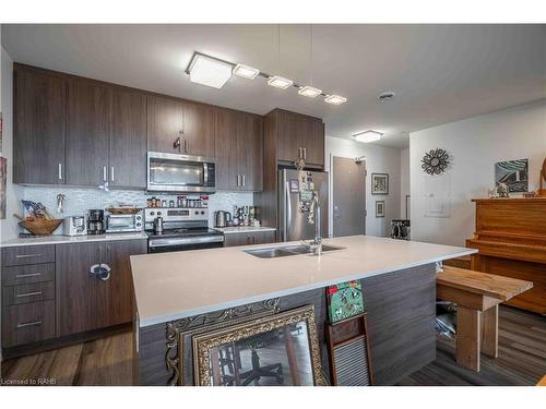 506-467 Charlton Avenue E, Hamilton, ON - Indoor Photo Showing Kitchen With Stainless Steel Kitchen With Double Sink With Upgraded Kitchen