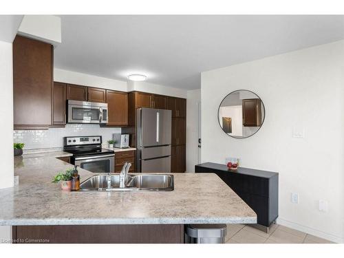 128 Mcmonies Drive, Waterdown, ON - Indoor Photo Showing Kitchen With Double Sink