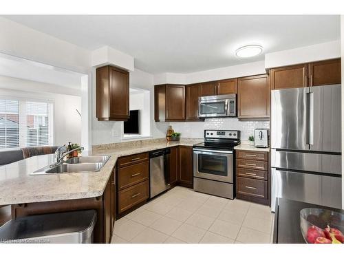 128 Mcmonies Drive, Waterdown, ON - Indoor Photo Showing Kitchen With Double Sink