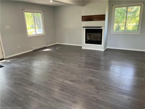 48 Nature Line, Lowbanks, ON - Indoor Photo Showing Living Room With Fireplace