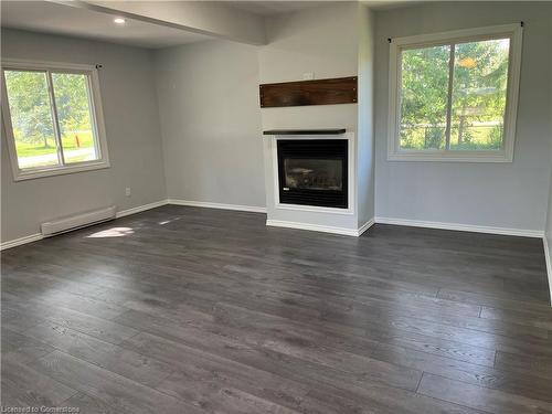 48 Nature Line, Lowbanks, ON - Indoor Photo Showing Other Room With Fireplace