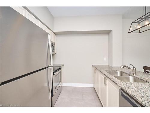 103-10 Concord Place, Grimsby, ON - Indoor Photo Showing Kitchen With Double Sink