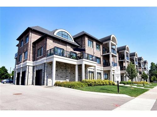 203-2605 Binbrook Road, Binbrook, ON - Outdoor With Balcony With Facade