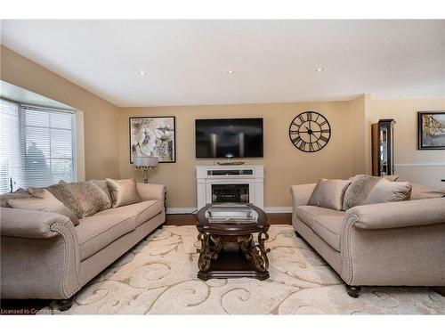 674 Laurier Avenue, Milton, ON - Indoor Photo Showing Living Room With Fireplace