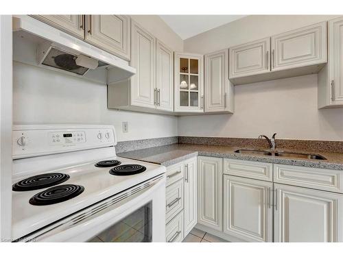 1505-2263 Marine Drive, Oakville, ON - Indoor Photo Showing Kitchen With Double Sink