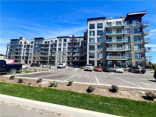 508-600 North Service Road, Stoney Creek, ON - Outdoor With Balcony With Facade