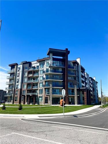 508-600 North Service Road, Stoney Creek, ON - Outdoor With Balcony With Facade