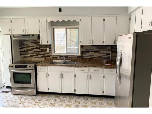 1-57 Ottawa Street N, Hamilton, ON - Indoor Photo Showing Kitchen With Double Sink