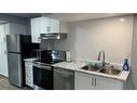 1-468 Main Street E, Hamilton, ON  - Indoor Photo Showing Kitchen With Stainless Steel Kitchen With Double Sink 