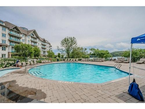 54-305-1235 Deerhurst Drive, Huntsville, ON - Outdoor With In Ground Pool