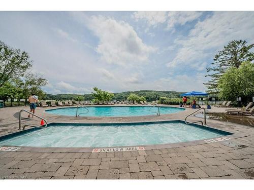 54-305-1235 Deerhurst Drive, Huntsville, ON - Outdoor With In Ground Pool